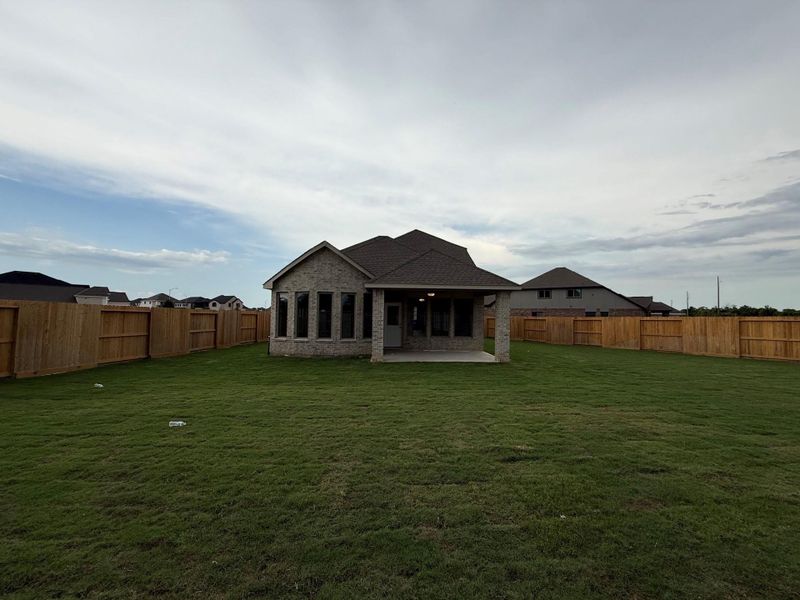 Exterior details and patio area of a home in Candela, Richmond (Image 3).