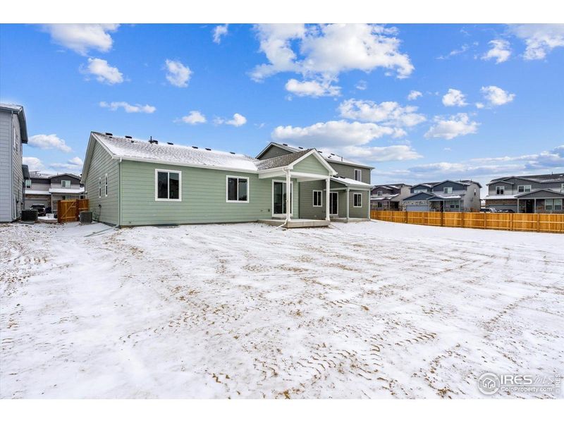 Exterior details and patio area of a home in The Overlook at Johnstown Farms, Johnstown (Image 3).