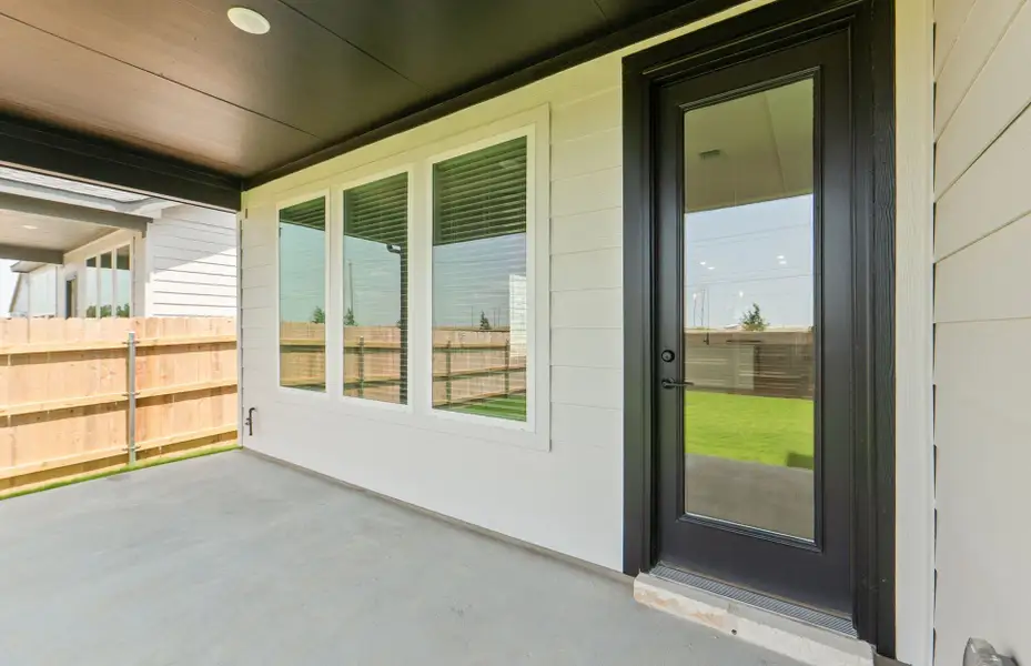 Exterior details and patio area of a home in Kuempel Farms, Pflugerville (Image 26).