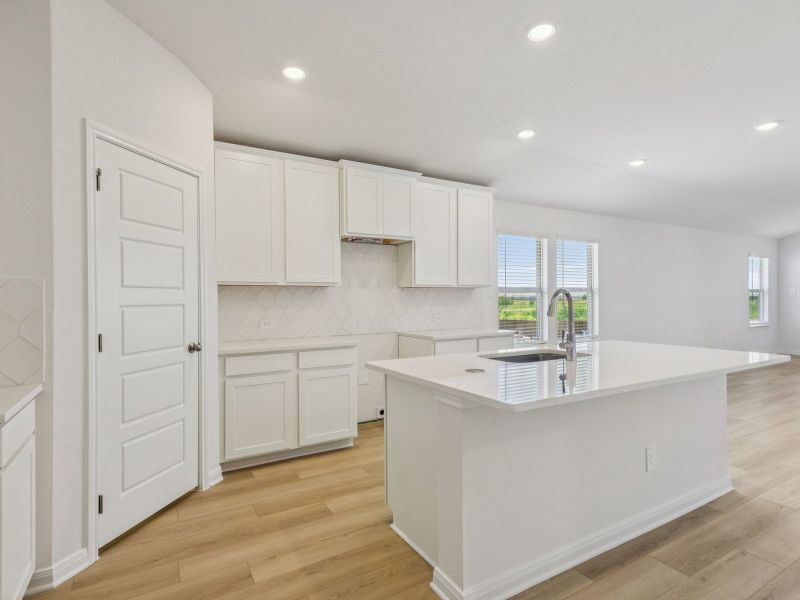 Kitchen in the Allen floorplan at a Meritage Homes community. Kitchen in the Allen floorplan at a Meritage Homes community.