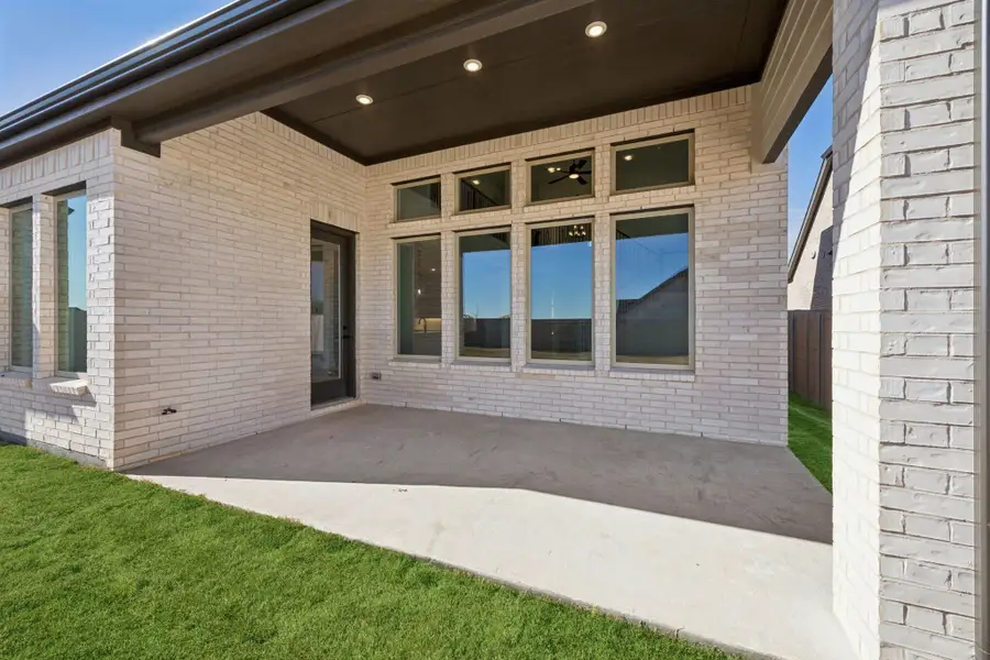 Exterior details and patio area of a home in Painted Tree Lakeside, McKinney (Image 20). Exterior details and patio area of a home in Painted Tree Lakeside, McKinney (Image 20).