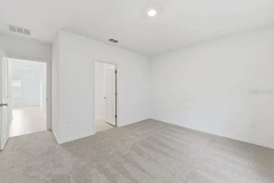 Spacious, unfurnished interior of a new home in Firethorn, Parrish (Image 18).