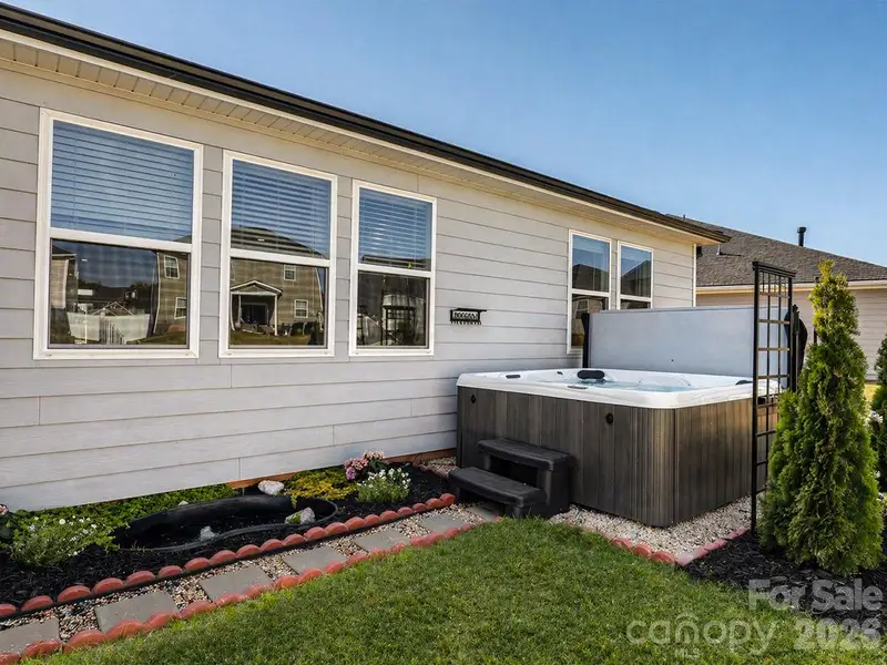 Exterior details and patio area of a home in Wilson Creek Executive Series, Indian Land (Image 3).