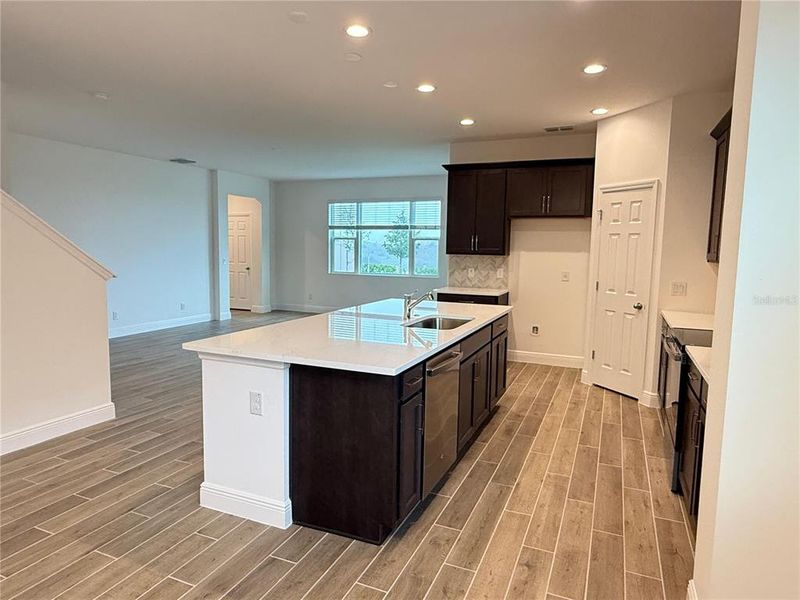 Furnished interior view inside a new home in Ridgeview, Clermont (Image 3).