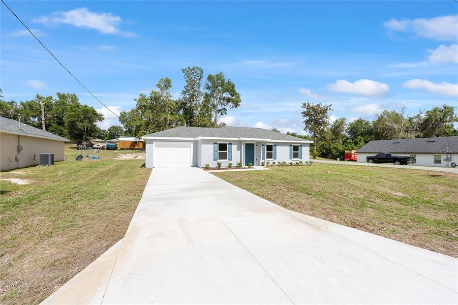 Front exterior of a new home in , Ocala, FL, highlighting curb appeal (Image 16).