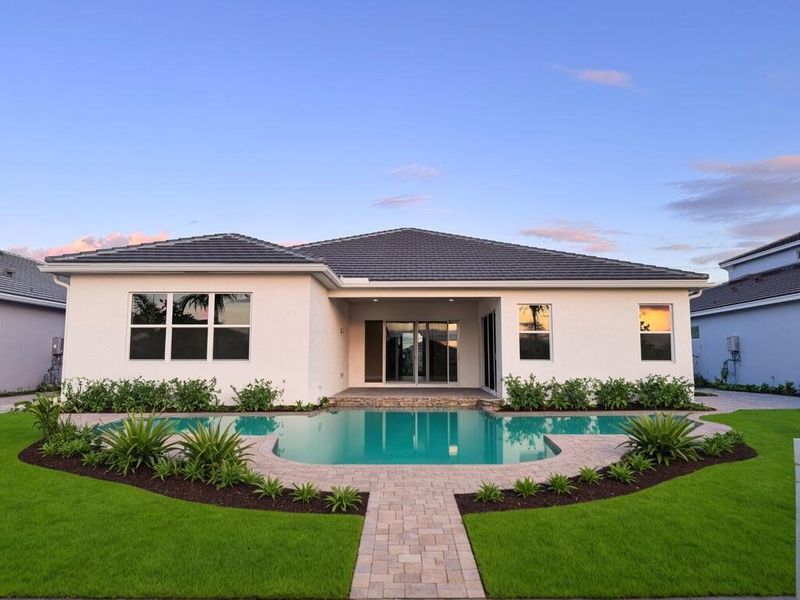 Exterior details and patio area of a home in Westlake, Loxahatchee (Image 28).