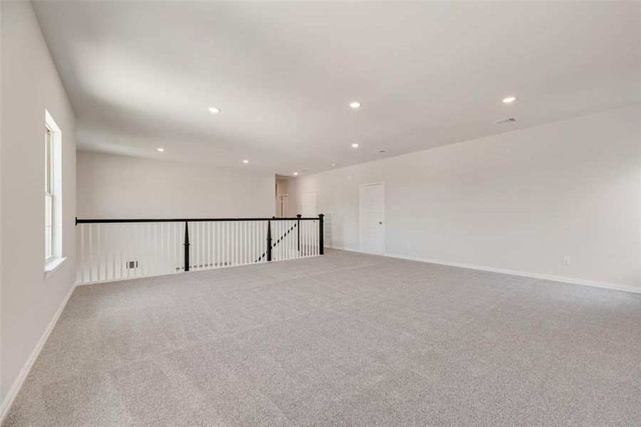 Spacious, unfurnished interior of a new home in Valencia On The Lake, Little Elm (Image 22).