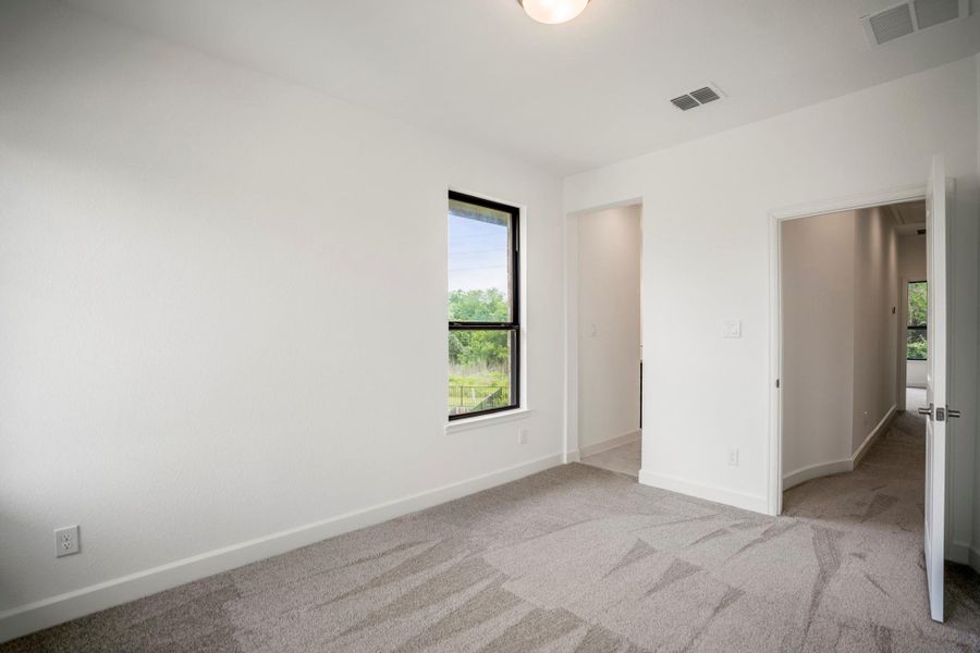 Spacious, unfurnished interior of a new home in Fulbrook on Fulshear Creek, Fulshear (Image 32).