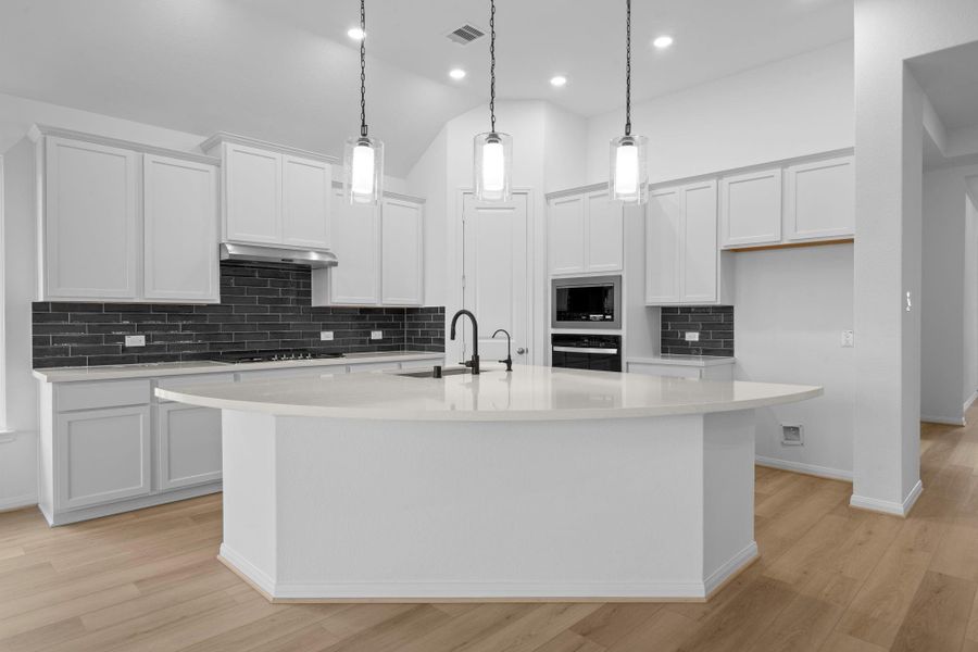 Furnished interior view inside a new home in Bridgeland, Cypress (Image 5).