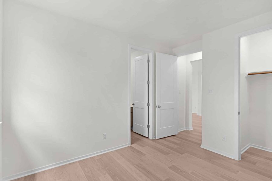 Spacious, unfurnished interior of a new home in Parkside on the River, Georgetown (Image 58).