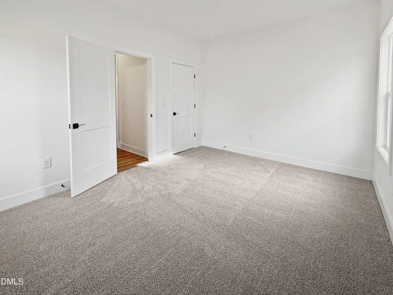 Spacious, unfurnished interior of a new home in Charlotte's Ridge, Middlesex (Image 19).