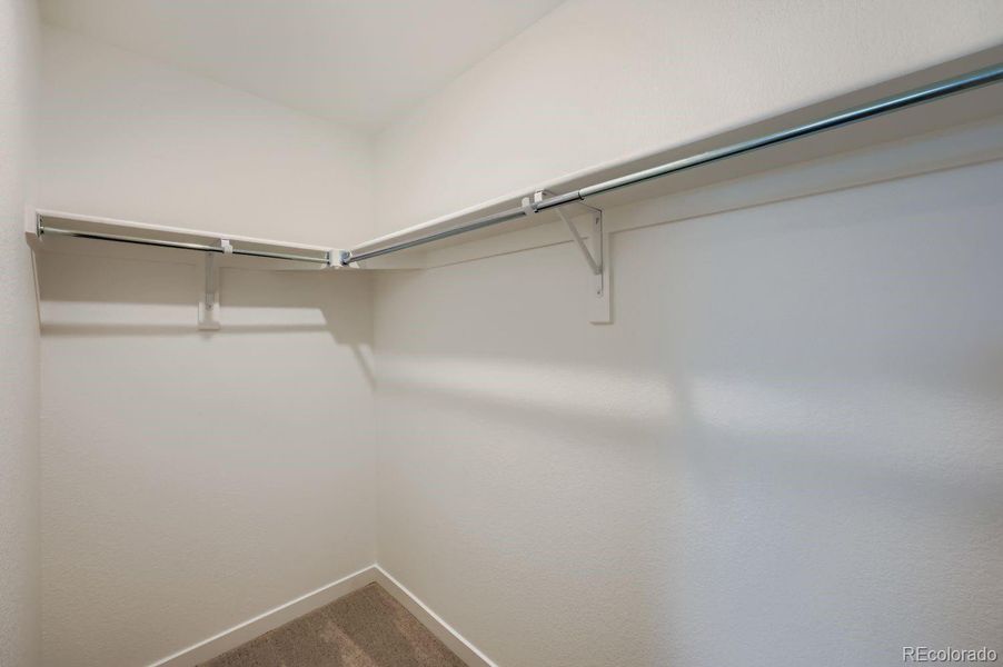 Spacious, unfurnished interior of a new home in Percheron: The Explorer Collection, Colorado Springs (Image 7).