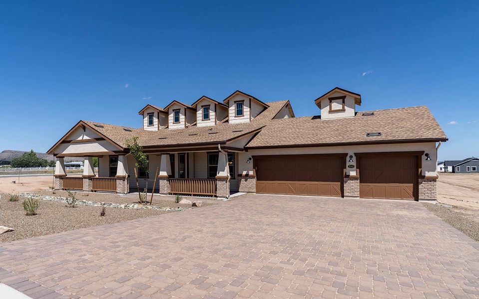 Front exterior of a new home in Heritage Pointe, Chino Valley, AZ, highlighting curb appeal (Image 2).