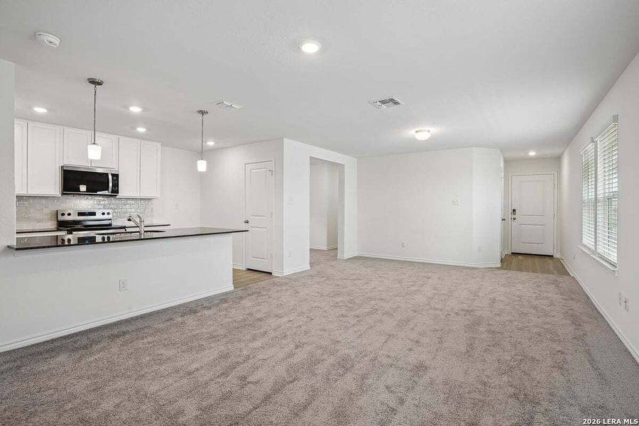 Spacious, unfurnished interior of a new home in Southton Cove, Elmendorf (Image 24).