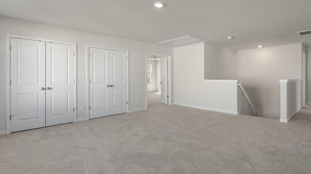 Representative unfurnished interior of a home built from the HARBOR OAK by D.R. Horton in Indigo Preserve, Leland (Image 34).