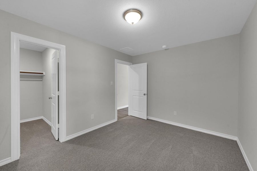 Spacious, unfurnished interior of a new home in The Enclave at Spring Branch, Conroe (Image 23).