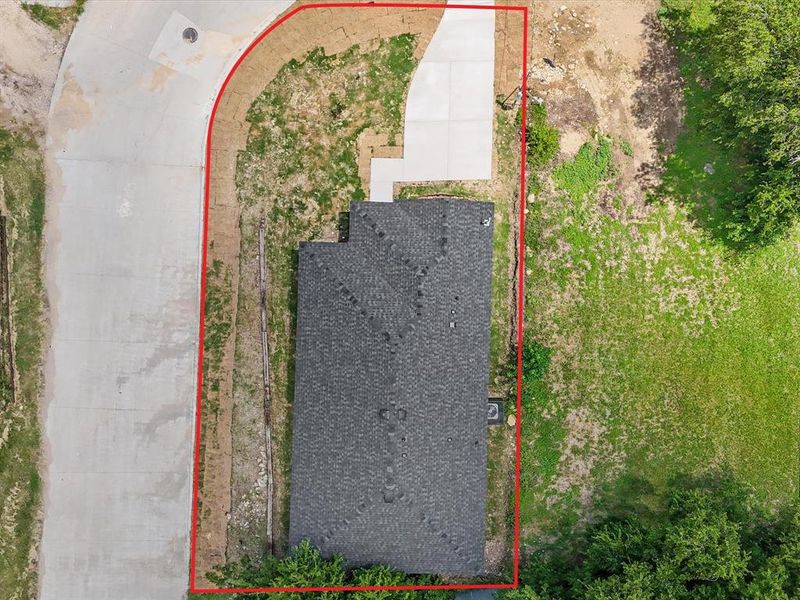 Aerial overview of property's location with property parcel outlined