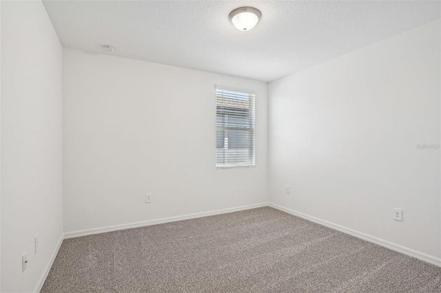 Spacious, unfurnished interior of a new home in Lake Deer Estates - Signature Series, Poinciana (Image 21). Spacious, unfurnished interior of a new home in Lake Deer Estates - Signature Series, Poinciana (Image 21).