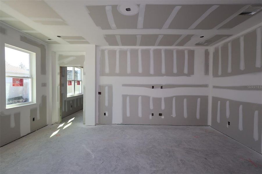 In-progress construction of a new home in Eden at Crossprairie, St. Cloud, FL (Image 7).