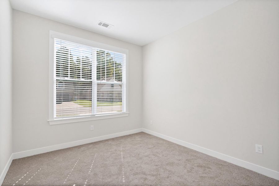 Spacious, unfurnished interior of a new home in Villages of Green Meadows, Munford (Image 22).