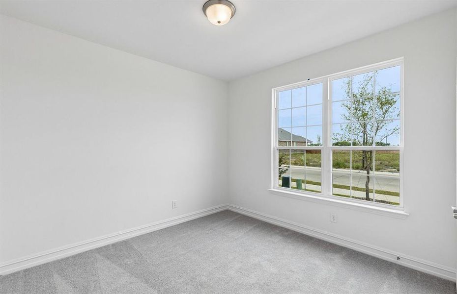 Secondary bedroom with large window