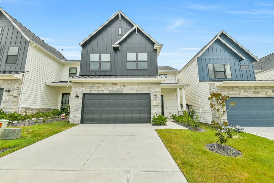 Front exterior of a new home in Summer Place  35', Montgomery, TX, highlighting curb appeal (Image 23).