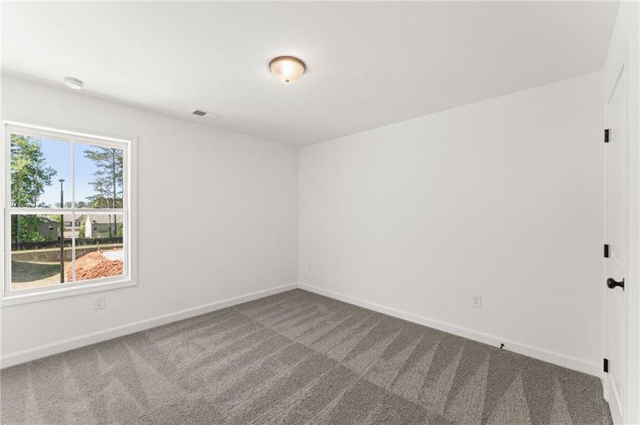 Spacious, unfurnished interior of a new home in Cherokee Township, Acworth (Image 27).