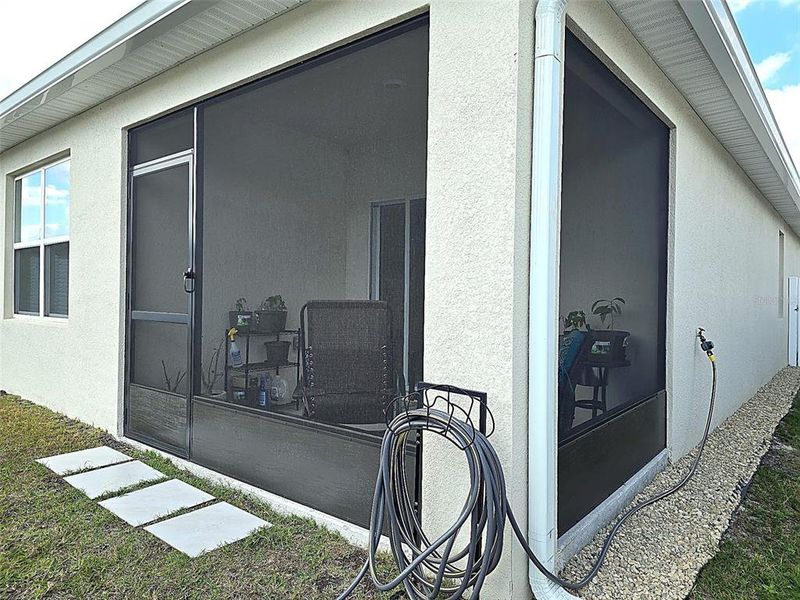 Exterior details and patio area of a home in Wind Meadows South, Bartow (Image 33).