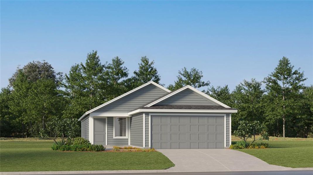 View of front of house featuring a garage and a front yard