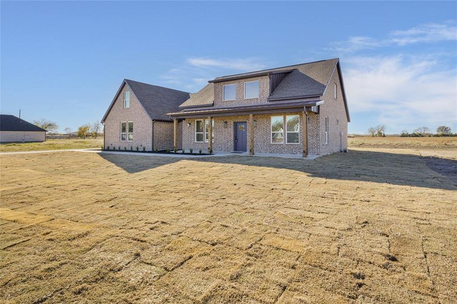Front exterior of a new home in , Brashear, TX, highlighting curb appeal (Image 24).