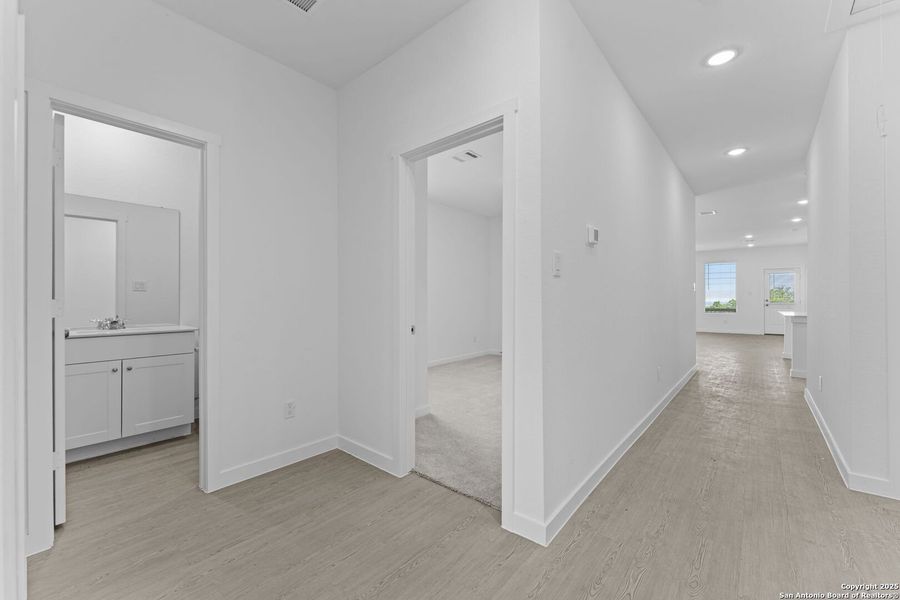 Spacious, unfurnished interior of a new home in Waterwheel: Coastline Collection, San Antonio (Image 11).