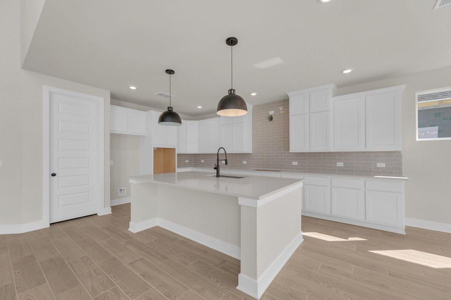 Furnished interior view inside a new home in Flora, Hutto (Image 6).