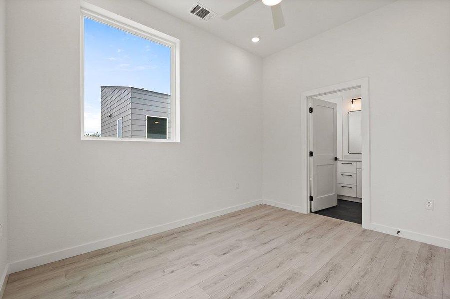 The room features light-colored flooring, white walls, and a window providing natural light
