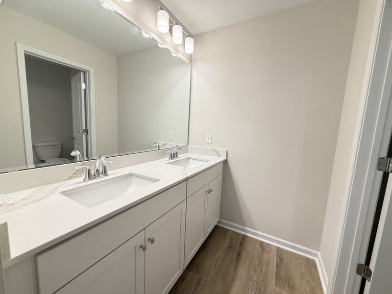 Furnished interior view inside a new home in Waterfall Estates, Whiteville (Image 8).