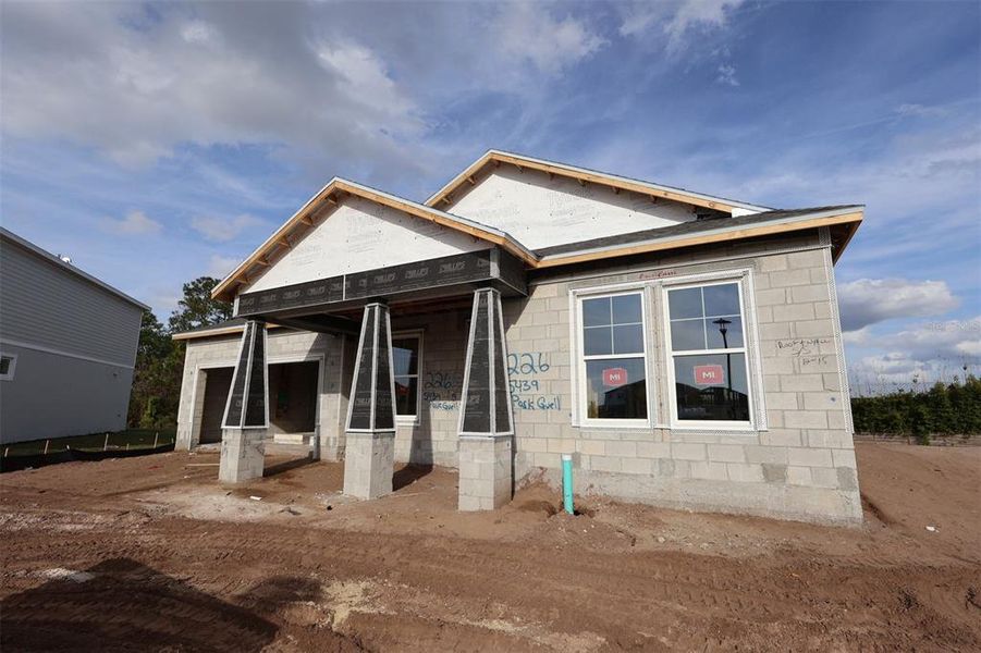 In-progress construction of a new home in Center Lake on the Park, St. Cloud, FL (Image 20).