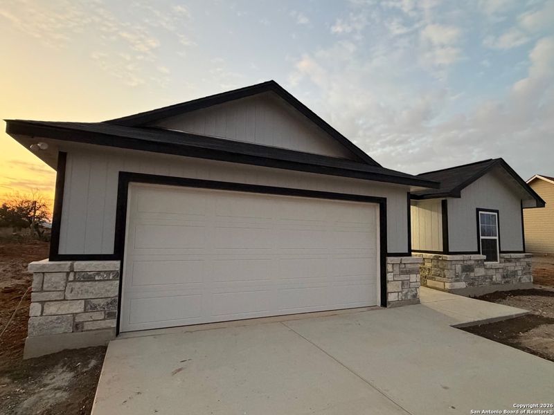 Front exterior of a new home in , Moore, TX, highlighting curb appeal (Image 2). Front exterior of a new home in , Moore, TX, highlighting curb appeal (Image 2).