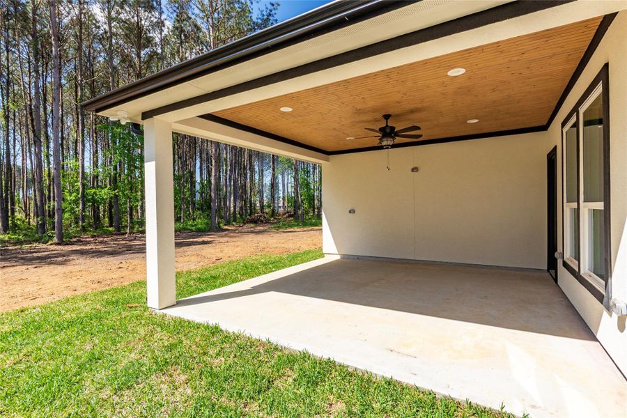 Front exterior of a new home in , Dayton, TX, highlighting curb appeal (Image 24).