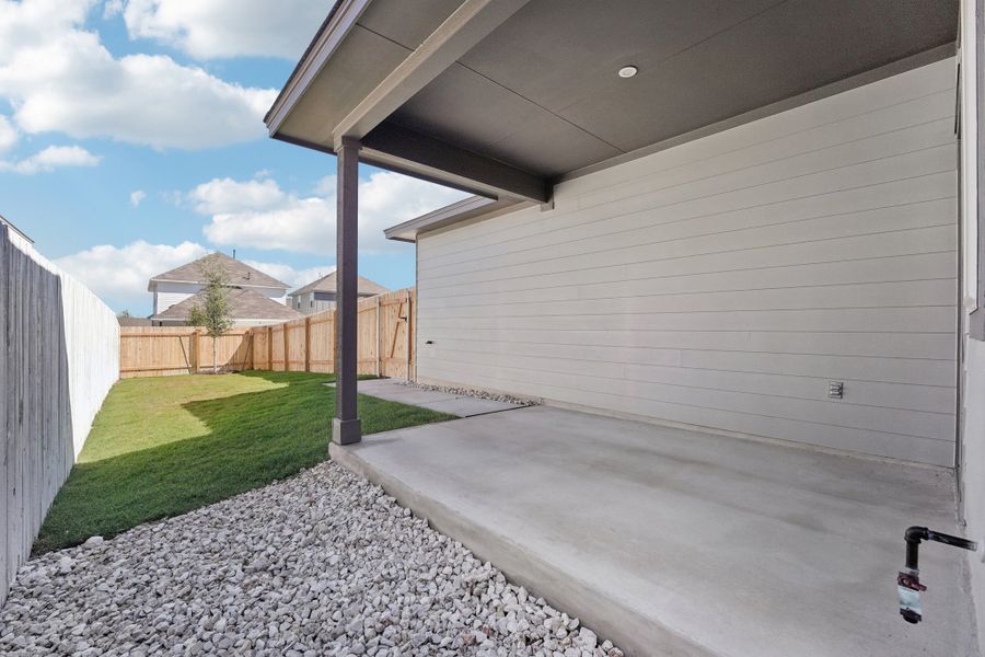 Exterior details and patio area of a home in Sage Hollow, Kyle (Image 2). Exterior details and patio area of a home in Sage Hollow, Kyle (Image 2).