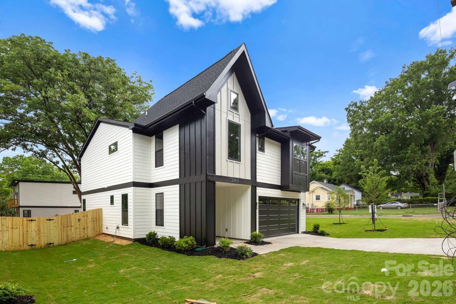 Front exterior of a new home in , Charlotte, NC, highlighting curb appeal (Image 26).