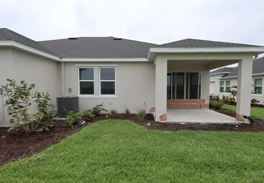 Exterior details and patio area of a home in Gracewater at Sarasota, Sarasota (Image 4).