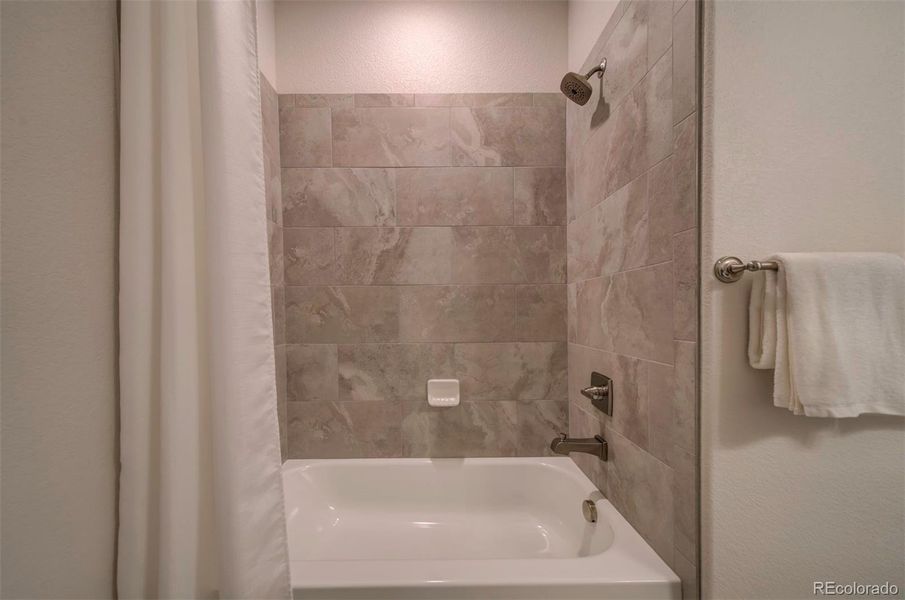 Tile surround in bathroom two.