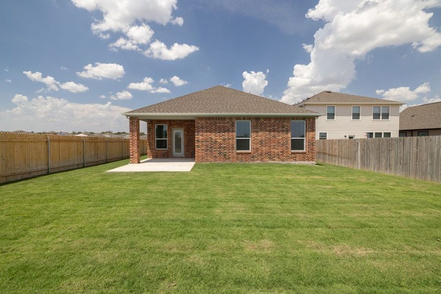 Exterior details and patio area of a home in Overlook Ranch, Georgetown (Image 18).