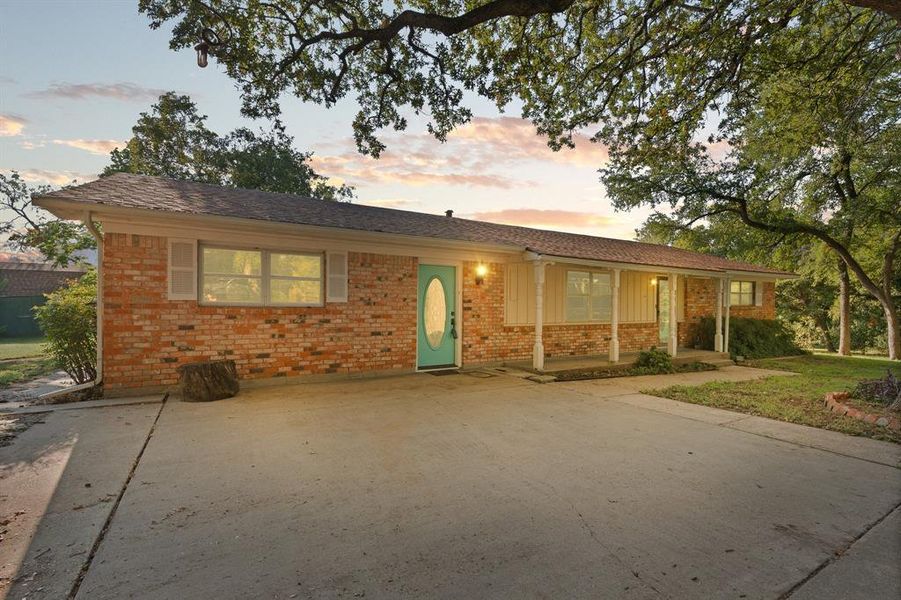 Front exterior of a new home in , Alvarado, TX, highlighting curb appeal (Image 22).