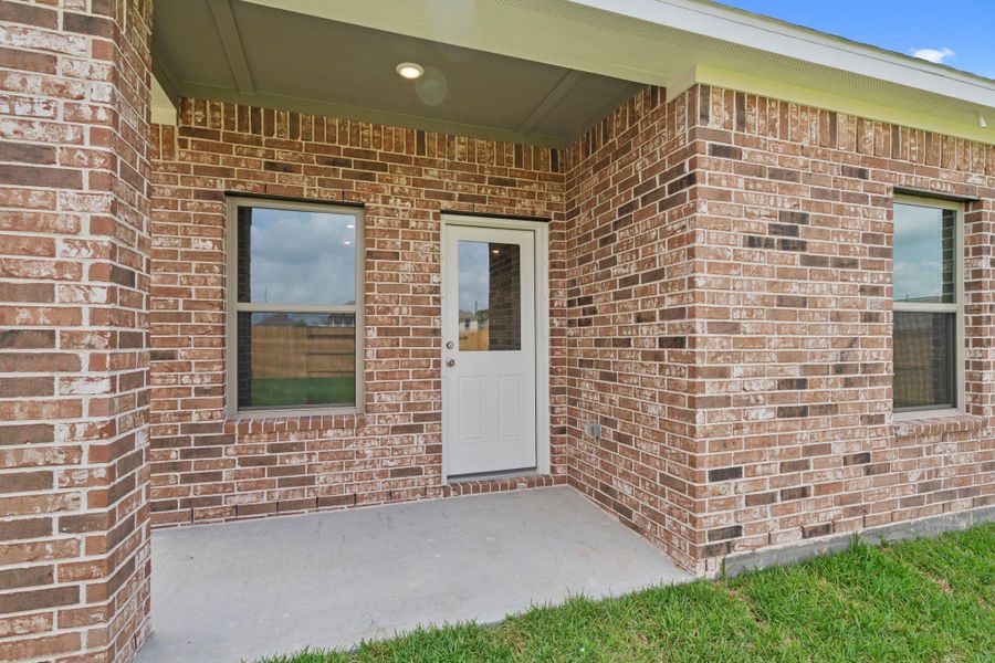 Exterior details and patio area of a home in Windrose Green, Angleton (Image 24). Exterior details and patio area of a home in Windrose Green, Angleton (Image 24).