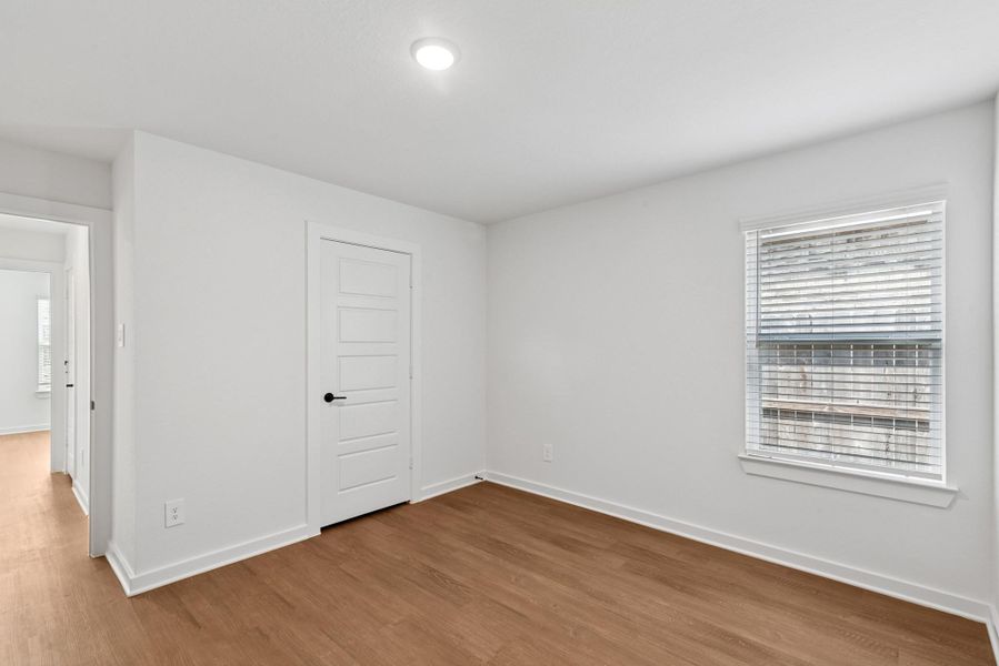 Spacious, unfurnished interior of a new home in Pinewood at Grand Texas, New Caney (Image 14).