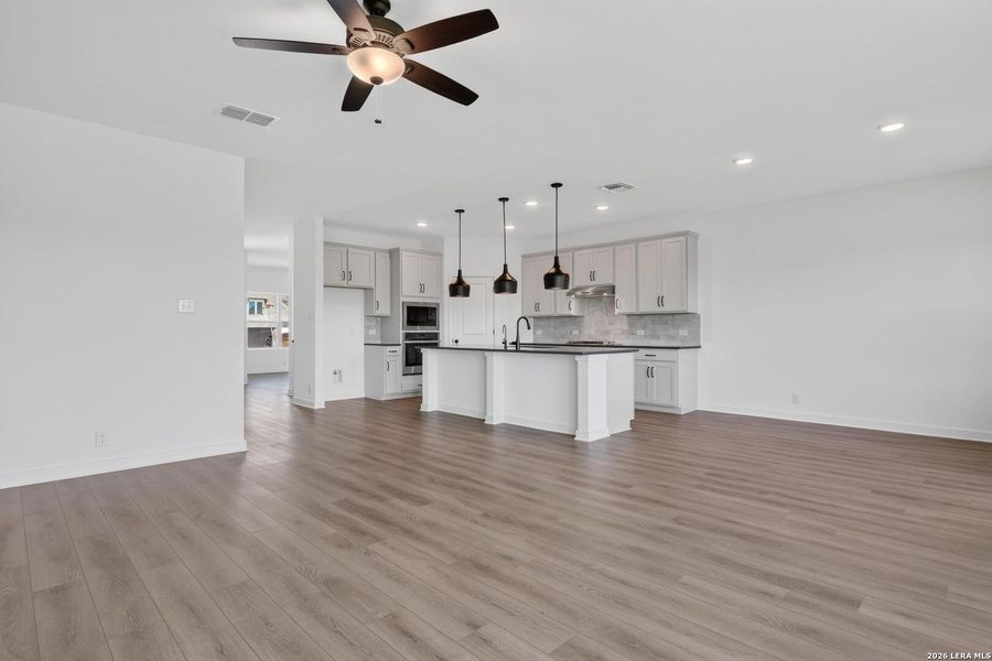 Furnished interior view inside a new home in Nopal Valley, San Antonio (Image 13).