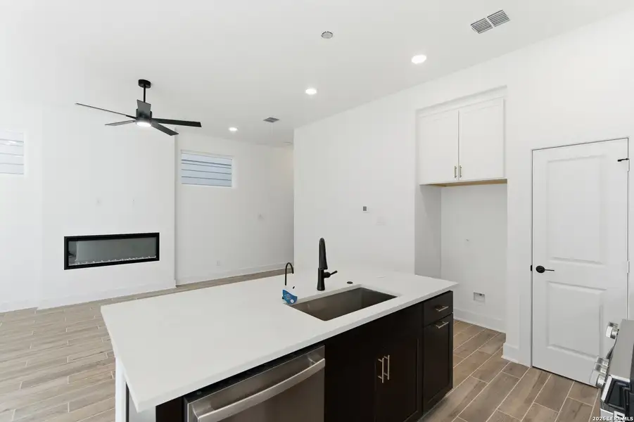 Furnished interior view inside a new home in Rose Hill, San Antonio (Image 5).