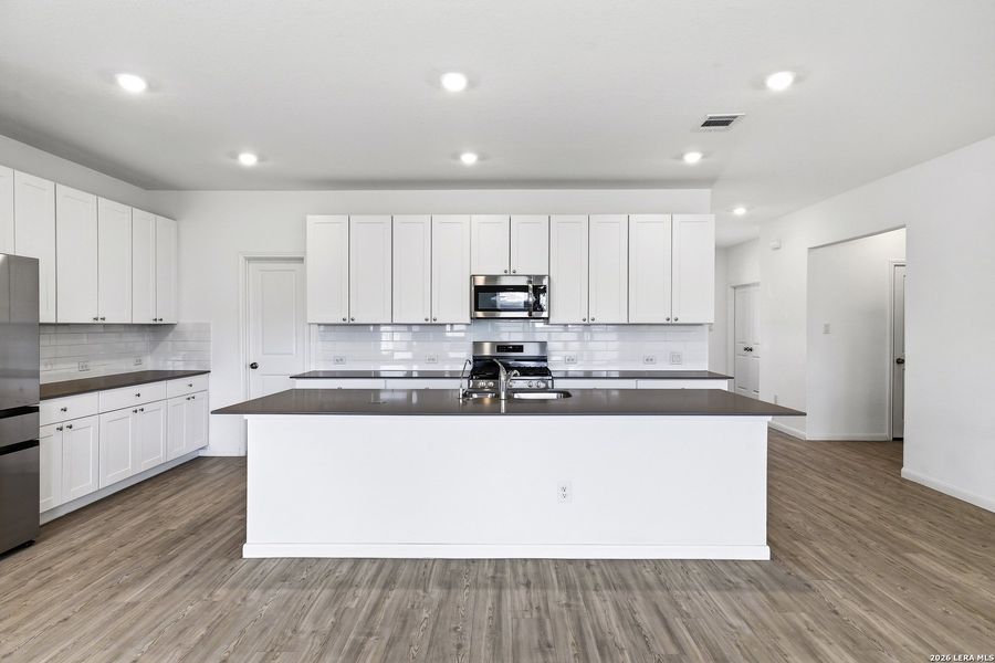 Furnished interior view inside a new home in Brookmill, San Antonio (Image 13).