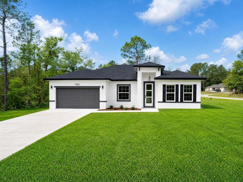 Front exterior of a new home in , Citrus Springs, FL, highlighting curb appeal (Image 1). Front exterior of a new home in , Citrus Springs, FL, highlighting curb appeal (Image 1).