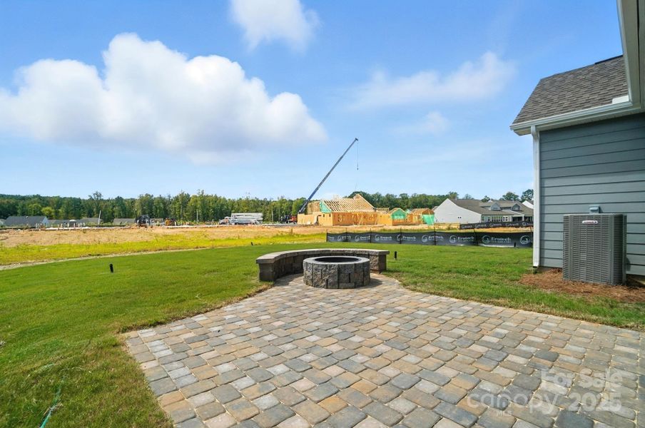 Front exterior of a new home in Heritage - 55+ Community, Indian Trail, NC, highlighting curb appeal (Image 23).